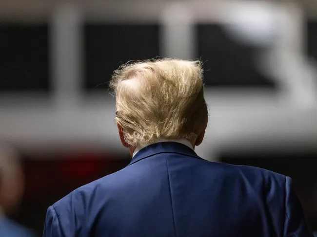 Donald Trump walking into court
